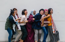 Multi-racial group of women celebrating after discovering the surprising collagen benefits for women
