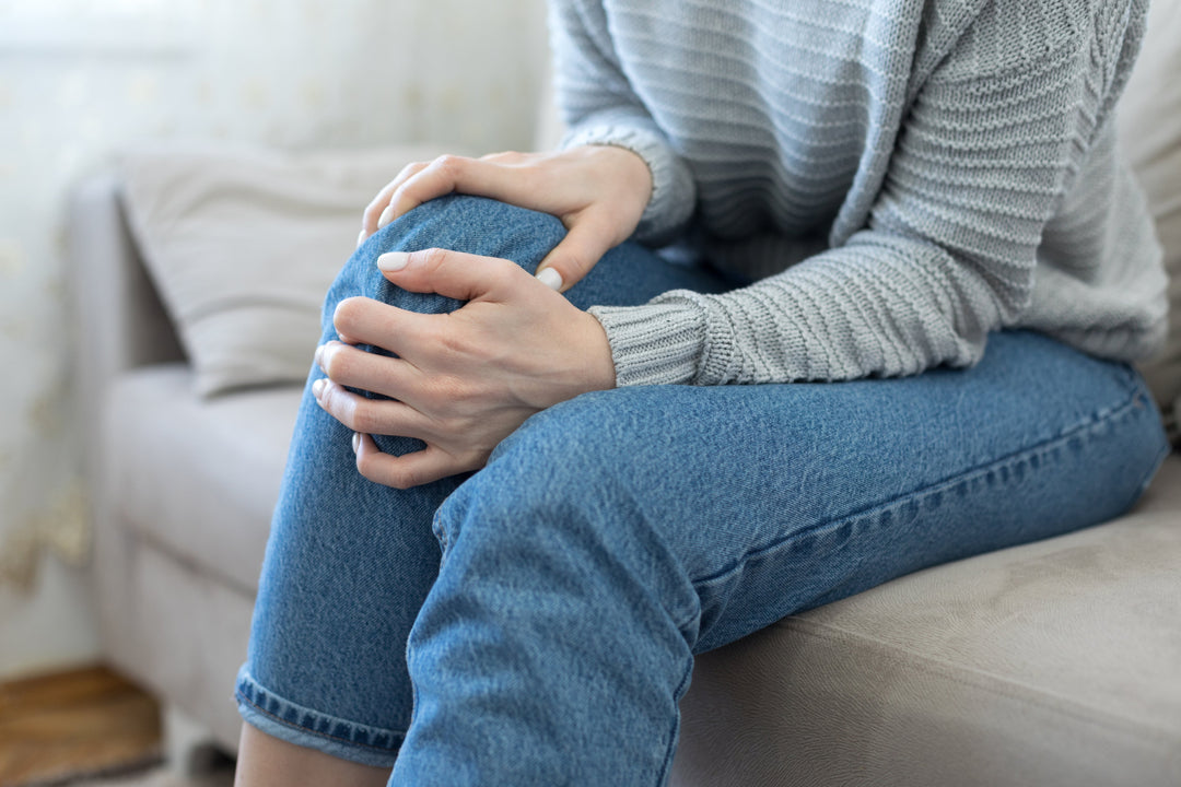 Woman with bad knee wondering, "Can collagen cure knee pain?"