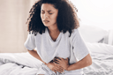 Woman enduring recovery time for hernia surgery