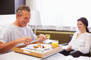 Patient in hospital eating a balanced diet—one of the best ways on how to prevent pressure ulcers