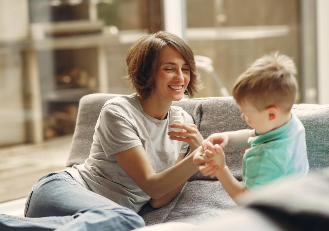 Smiling mom educating her son about the benefits of taking daily supplements