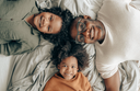 Father and two sons are grinning happily after learning how to take collagen and its amazing benefits