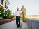 An elderly woman incorporates the best diet for arthritis and early morning walks into her recovery plan for faster healing