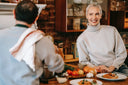 Smiling wife giving tips to her husband about how to get collagen in your diet