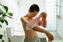 Woman checking her surgical wound while wondering, “Does collagen make you gain weight?”