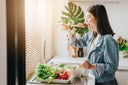 Young woman eating healthy food to speed up hip cartilage repair without surgery