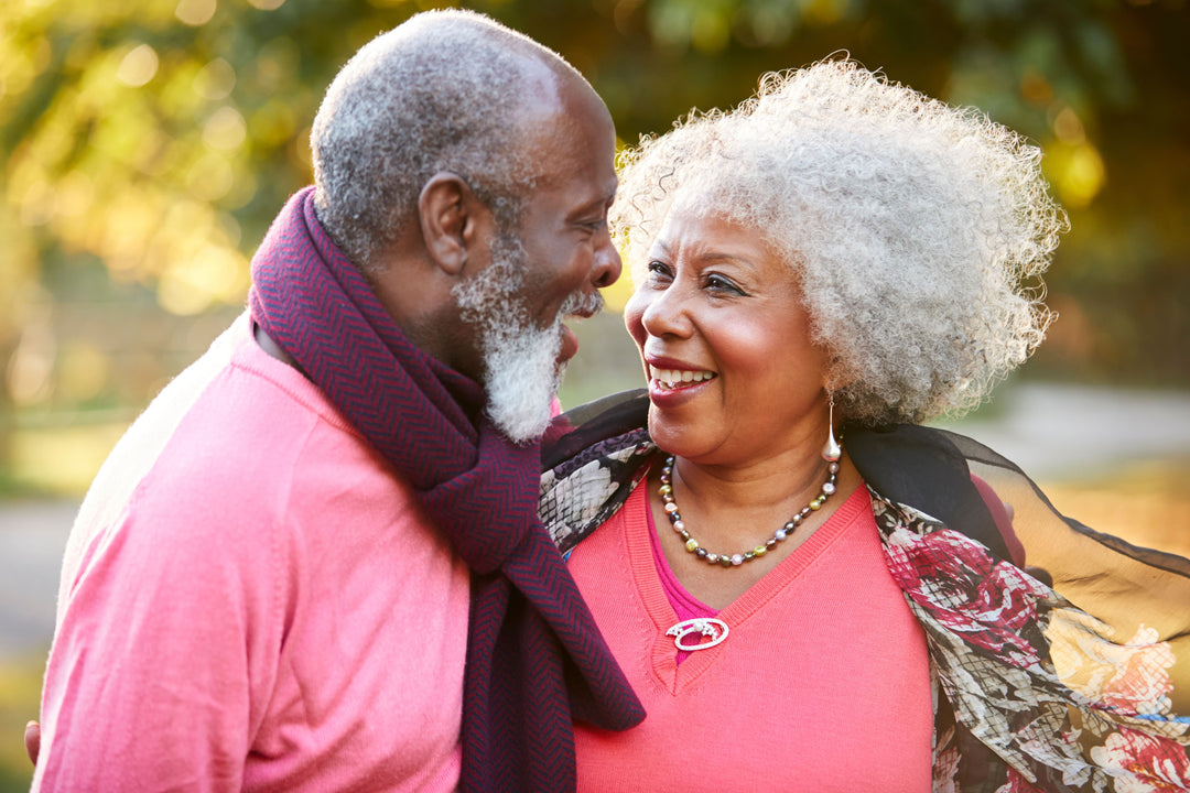 Senior couple happily benefiting from enhanced memory due to the consistent use of memory loss supplements